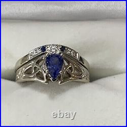 14k white gold wedding set withquality pear shape sapphire. Size 6.3/4