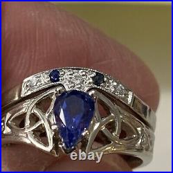 14k white gold wedding set withquality pear shape sapphire. Size 6.3/4