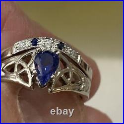 14k white gold wedding set withquality pear shape sapphire. Size 6.3/4