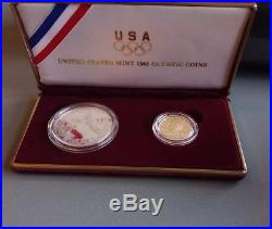1988 US Olympic 2-Coin Commemorative Set. 24 Troy ounce of pure gold. 85 Silver