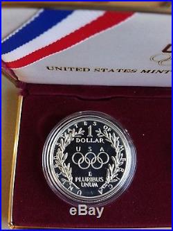 1988 US Olympic 2-Coin Commemorative Set. 24 Troy ounce of pure gold. 85 Silver
