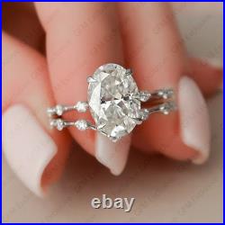 2.42 TCW Oval Cut D FL Moissanite Bridal Set In Solid Pure 14K White Gold
