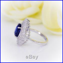 7.20 CTW Blue Sapphire with Diamond Halo set in Pure White Gold