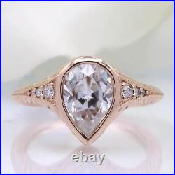 9X6 MM Bezel Set Pear Cut Moissanite 10k Rose Gold Perfect Anniversary Ring