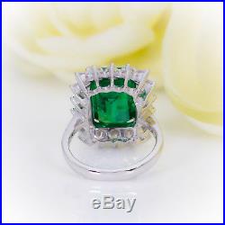 Cushion Cut Emerald with Diamond Halo set in Pure White Gold