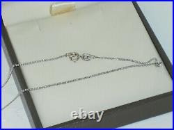 GOLDSMITHS 9ct white gold 0.15ct tension set diamond solitaire necklace, perfect