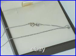 GOLDSMITHS 9ct white gold 0.25ct tension set diamond solitaire necklace, perfect