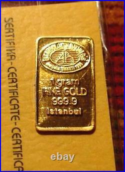 LOT OF FIVE 1g GOLD BAR SET COA AND PROTECTIVE HOLDER. 9999 PURE METAL 24K L@@K