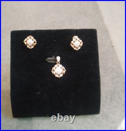 New Swiss Kinnari Ayana Blossom Jewellery diamond Set resting upon pure 14K gold