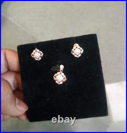 New Swiss Kinnari Ayana Blossom Jewellery diamond Set resting upon pure 14K gold