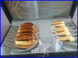 Set of 6 solid silver gold plated spoons in original case. Perfect condition