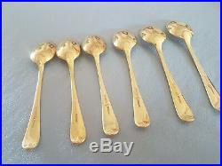 Set of 6 solid silver gold plated spoons in original case. Perfect condition