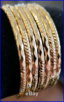 Set of 7 Brand New Pure 14k gold Bangle bracelets 6.7 in long Petite. 3 mm wide