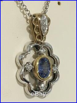 Yellow and White Gold Pendant set with a sapphire and diamonds perfect