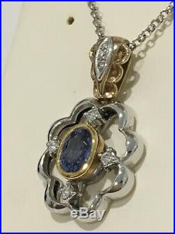 Yellow and White Gold Pendant set with a sapphire and diamonds perfect